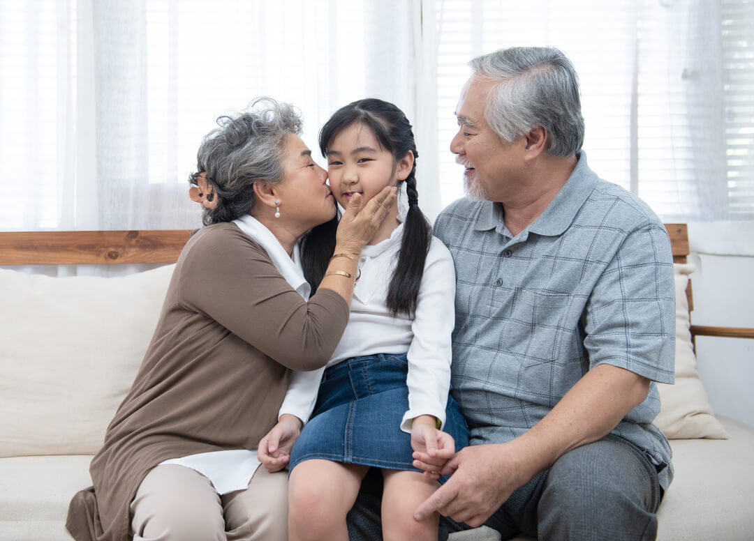 grandparents with grandchild